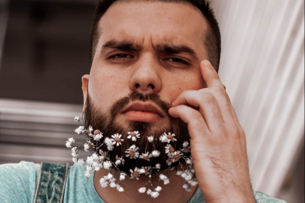 flower-bearded man