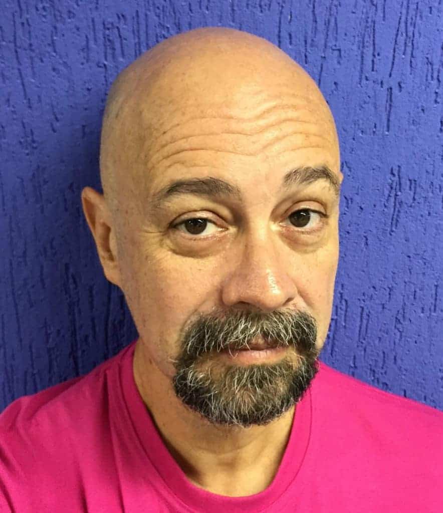 Man with bald head and goatee